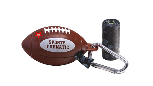 Sports Furnatic's dog poop bag dispenser named The Tail Gater®. It is laying next to a single role of black bags next to it and one roll inside.